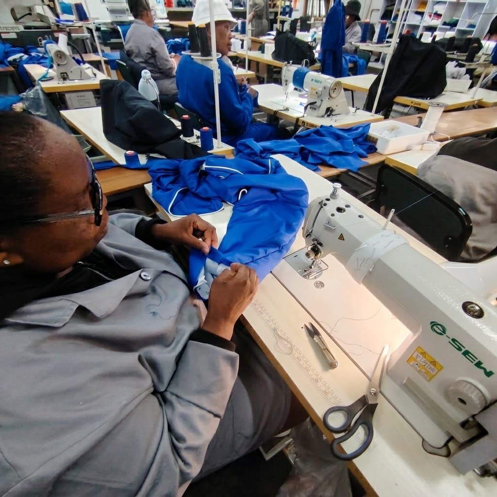 H&M manufacturing team at work on the factory floor